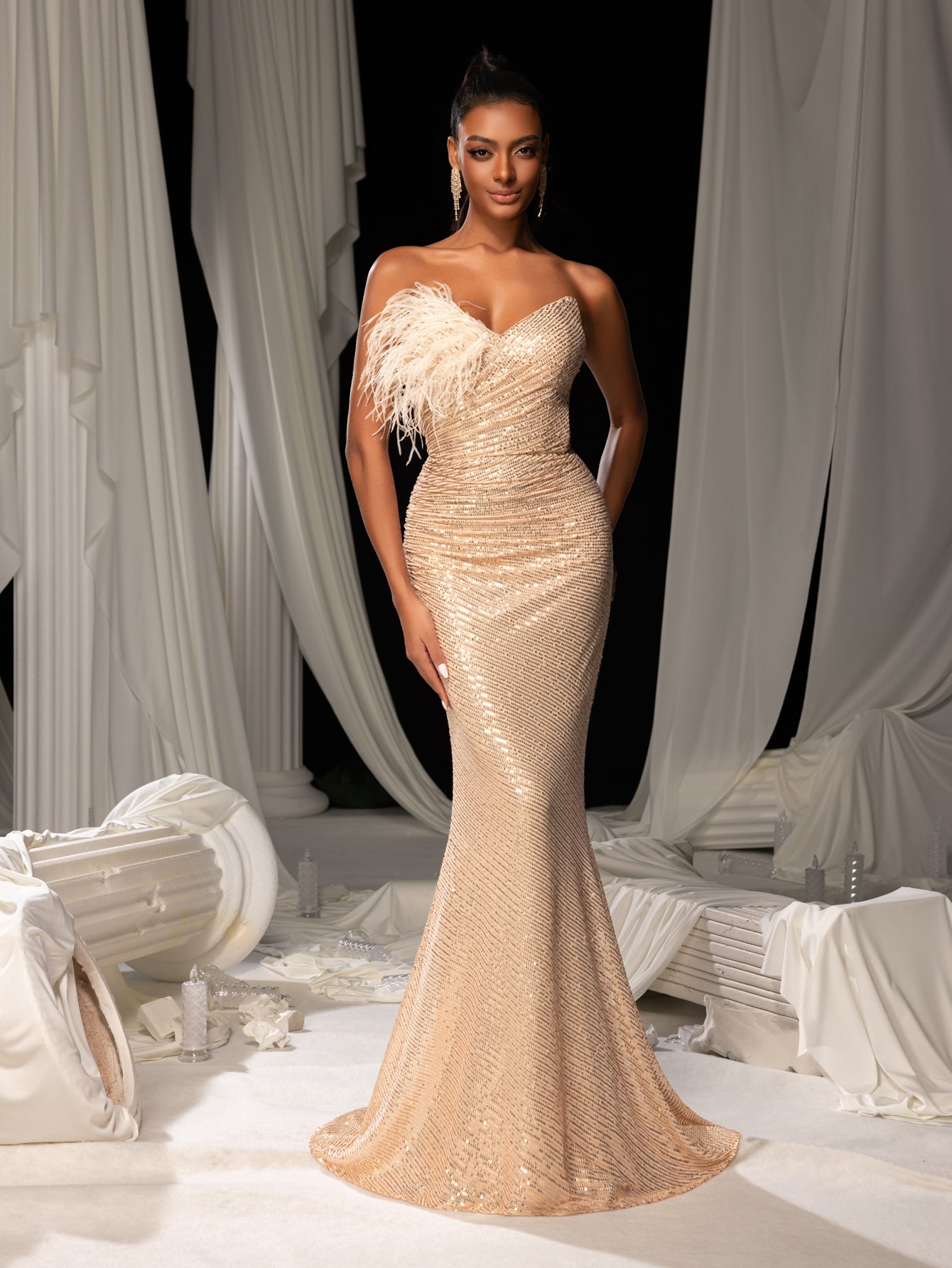 Elegant Feather Accent Strapless Mermaid Gown with Lace-Up Back