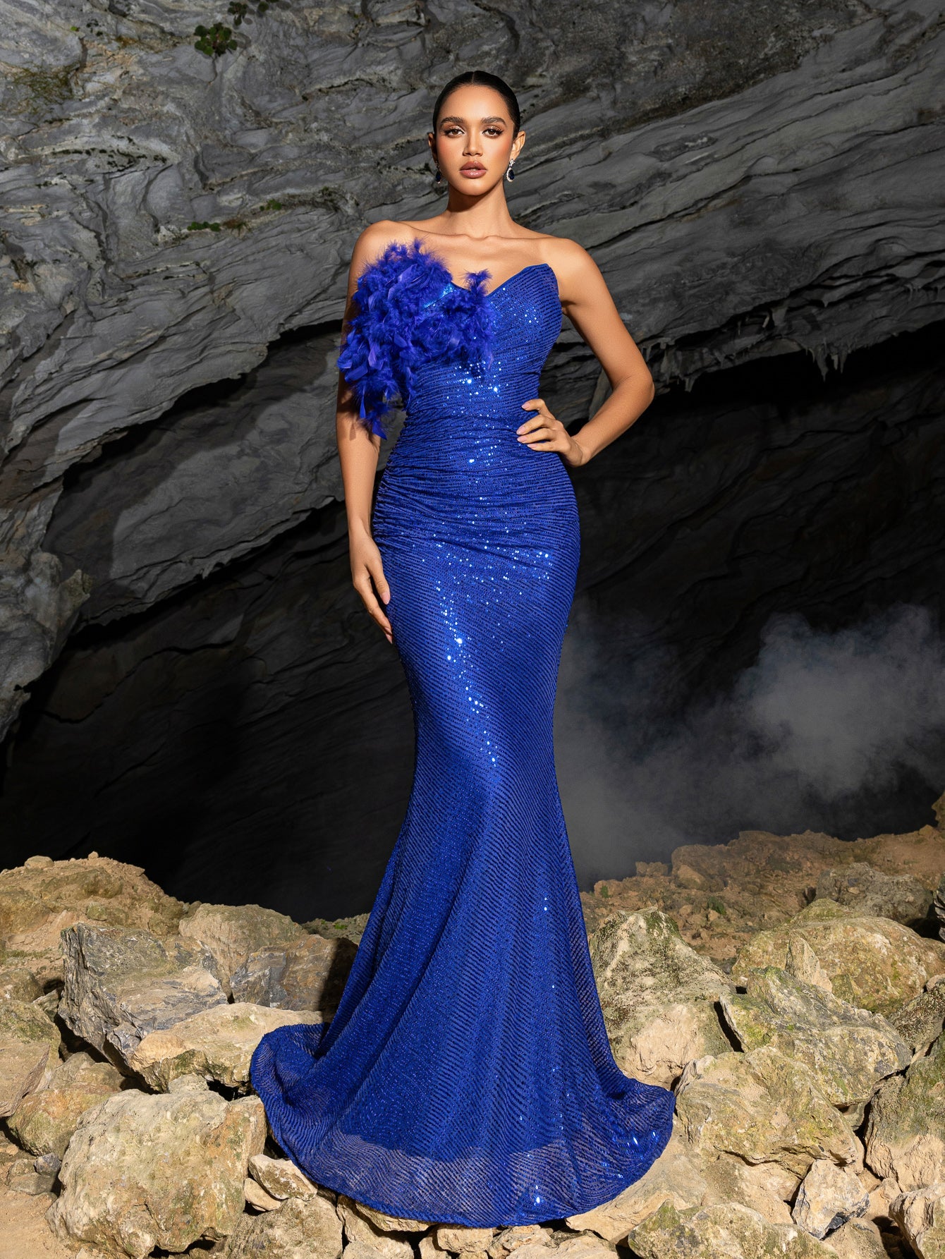 Elegant Feather Accent Strapless Mermaid Gown with Lace-Up Back