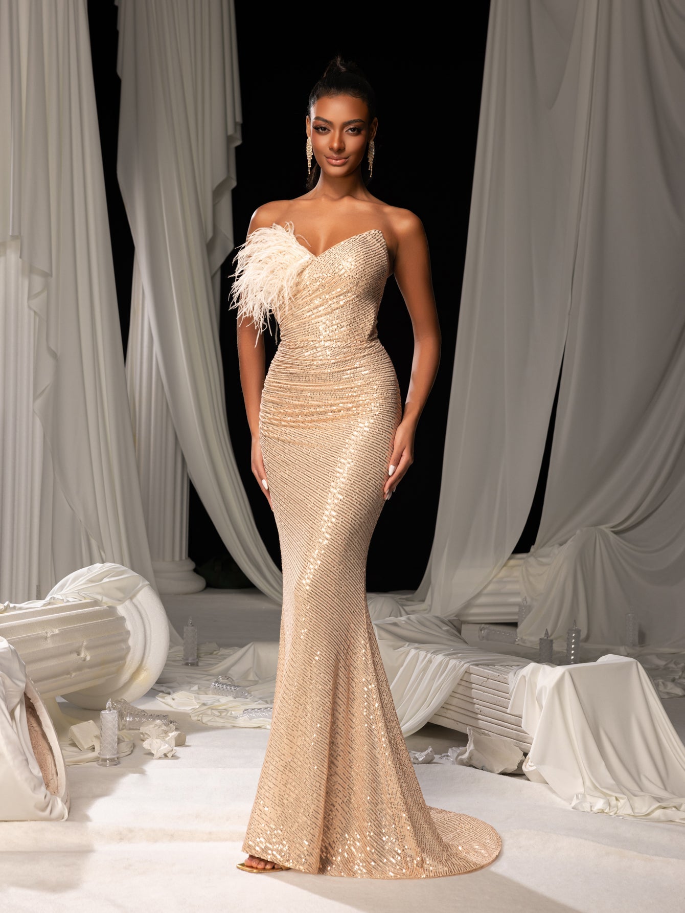 Elegant Feather Accent Strapless Mermaid Gown with Lace-Up Back