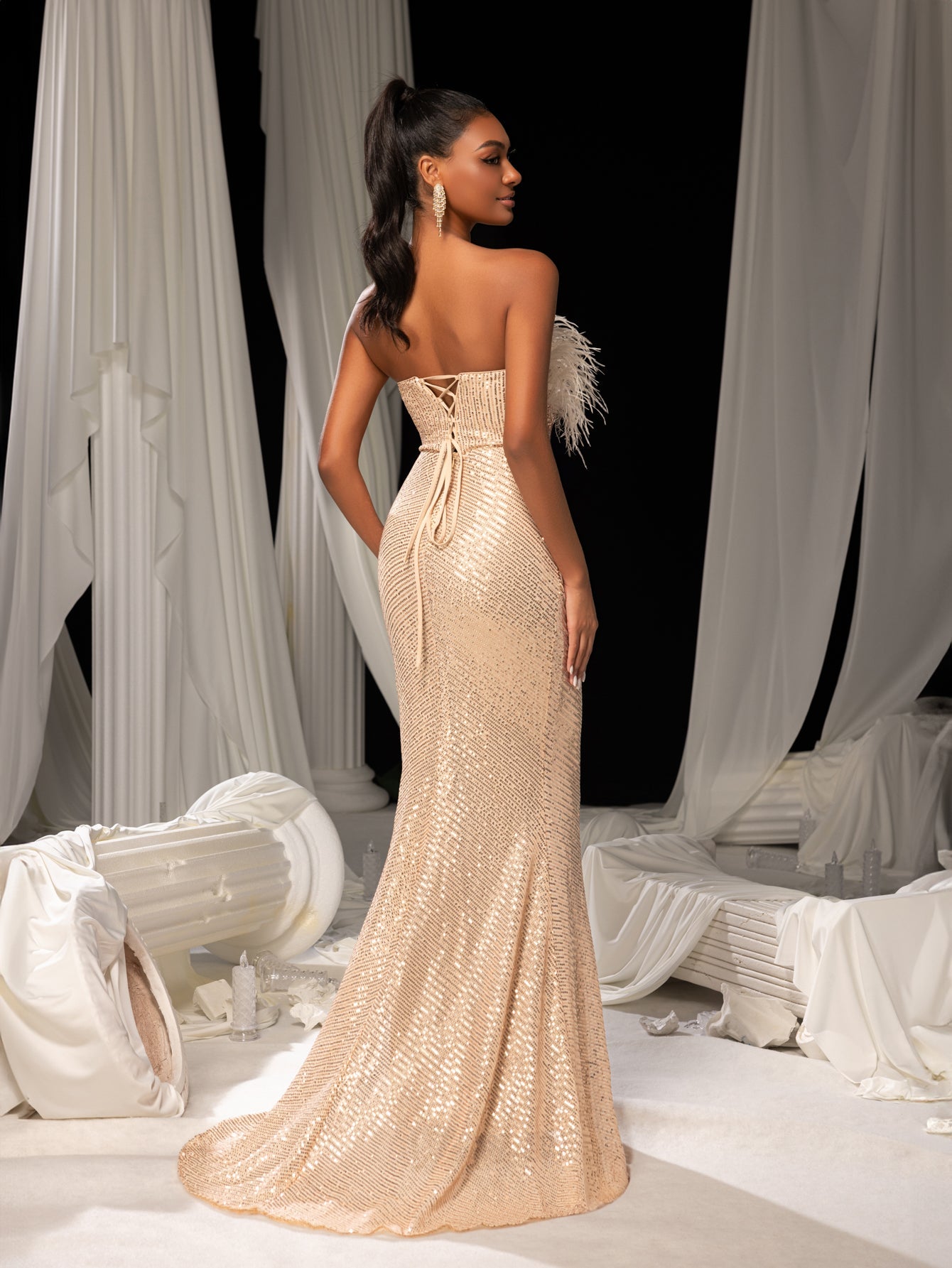 Elegant Feather Accent Strapless Mermaid Gown with Lace-Up Back