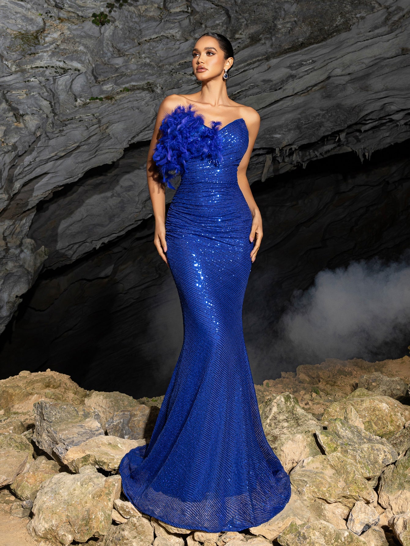 Elegant Feather Accent Strapless Mermaid Gown with Lace-Up Back