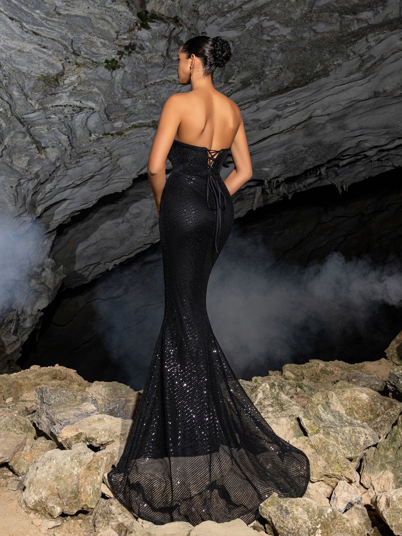 Elegant Feather Accent Strapless Mermaid Gown with Lace-Up Back